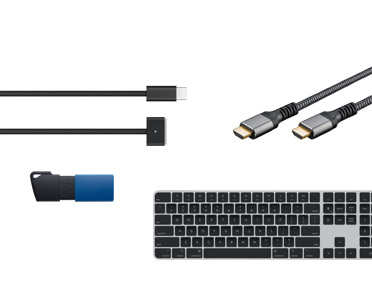 Een toetsenbord, een usb-stick en een paar kabels naast elkaar
